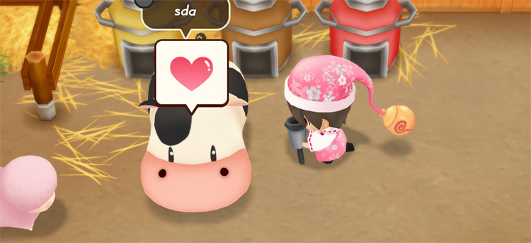 The farmer harvests Milk from mature cows using the Milker. / Story of Seasons: Friends of Mineral Town