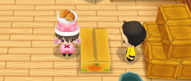 The farmer stands in front of Huang’s counter while holding a plate of Curry Bread. / Story of Seasons: Friends of Mineral Town