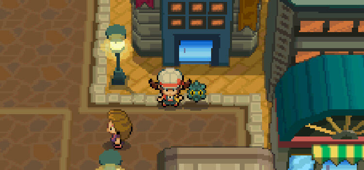 Outside the Goldenrod Dept. Store with a Bronzor (Pokémon HeartGold)