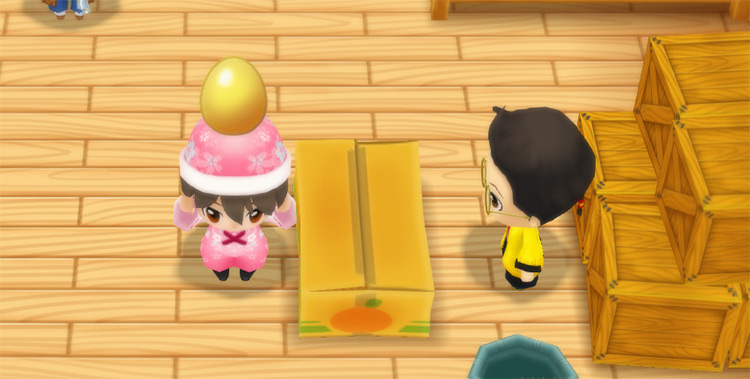 The farmer stands in front of Huang’s counter while holding a Golden Egg. / Story of Seasons: Friends of Mineral Town