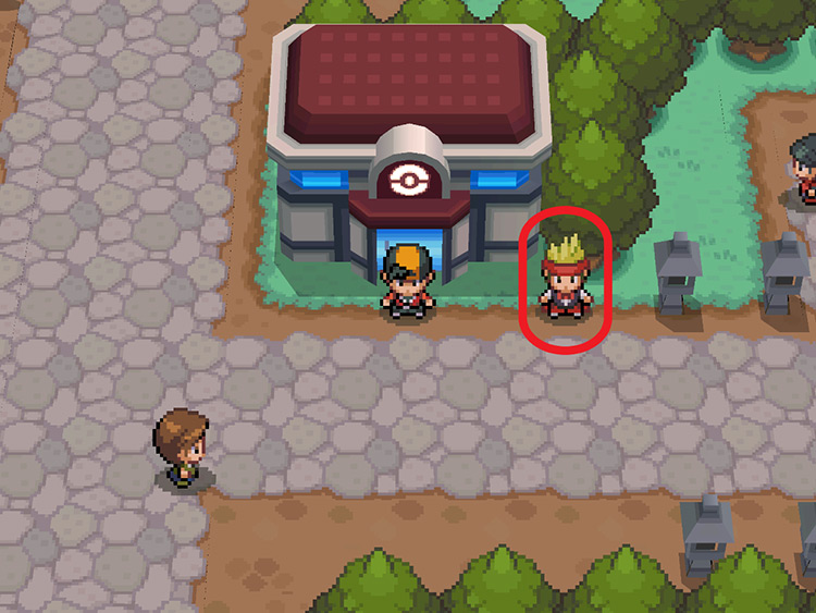 Outside the Violet City Pokémon Center, with the Berry Juggler encircled in red / Pokémon HeartGold and SoulSilver