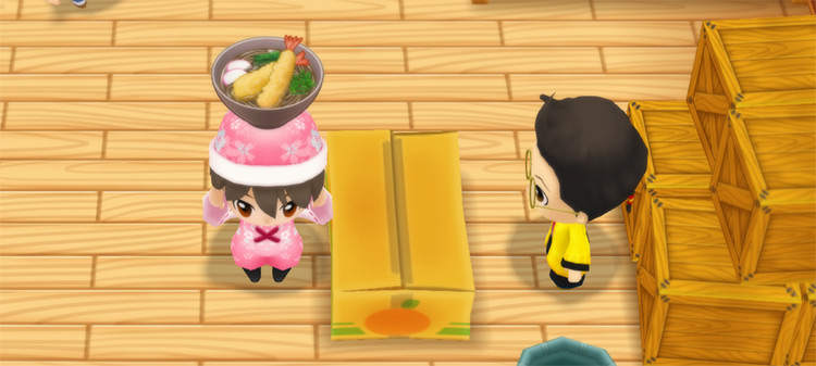 The farmer stands in front of Huang’s counter while holding a bowl of Tempura Soba. / Story of Seasons: Friends of Mineral Town