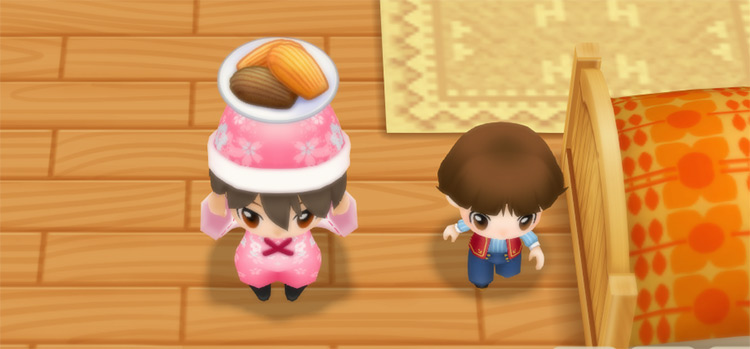 The farmer stands next to Yu while holding a plate of Madeleines. / Story of Seasons: Friends of Mineral Town