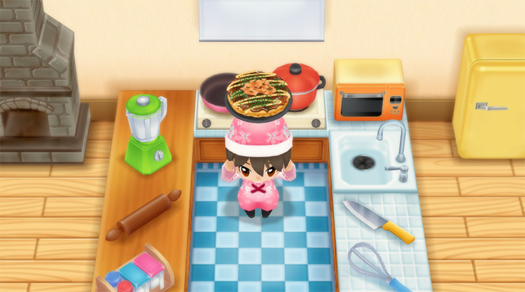 The farmer cooks Okonomiyaki in the kitchen. / Story of Seasons: Friends of Mineral Town