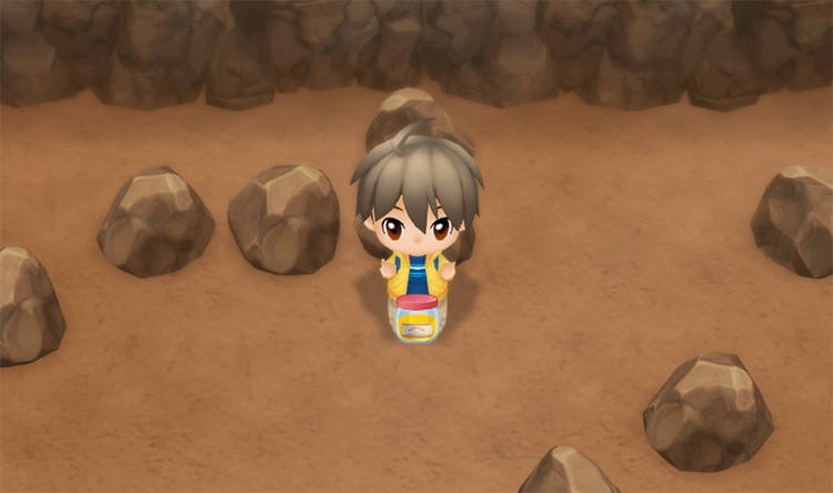 The farmer drinks Stamina Booster XL in the Spring Mine. / Story of Seasons: Friends of Mineral Town