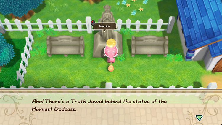 The farmer interacts with the Goddess statue beside the Church. / Story of Seasons: Friends of Mineral Town