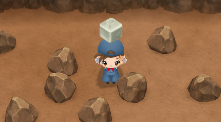 The farmer harvests Material Stone in the Mine. / Story of Seasons: Friends of Mineral Town