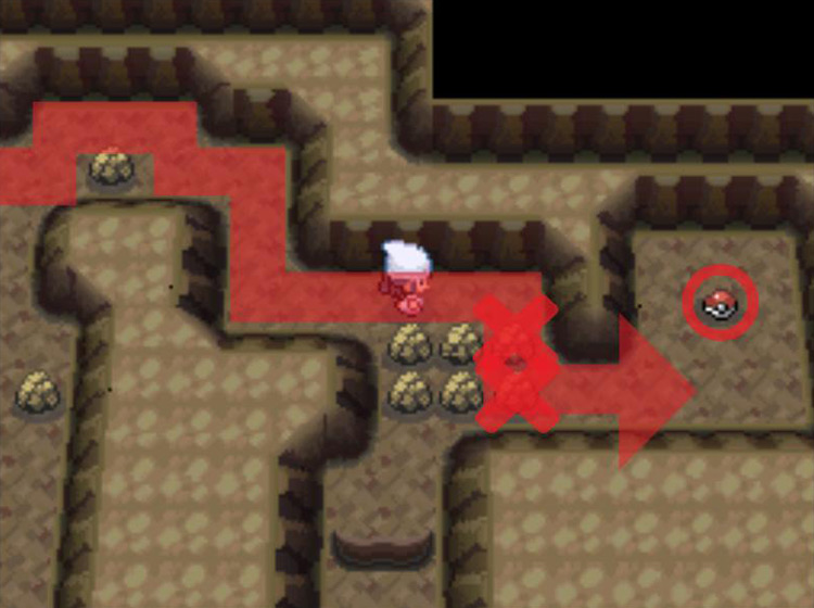 Smashing rocks to reach the Luck Incense in the small chamber. / Pokémon Platinum