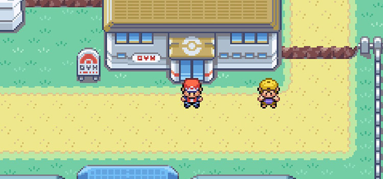 Standing outside the Cerulean City Gym in Pokémon FireRed