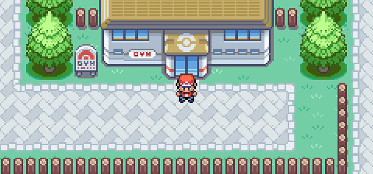 Standing outside the Pewter City Gym in Pokémon FireRed
