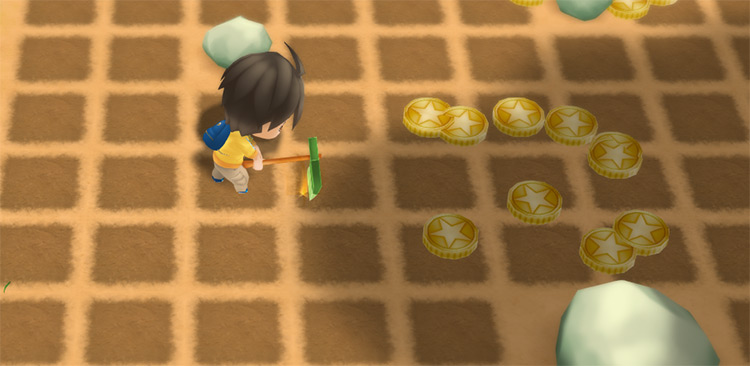 Digging up golden coins by tilling the field. / Story of Seasons: Friends of Mineral Town