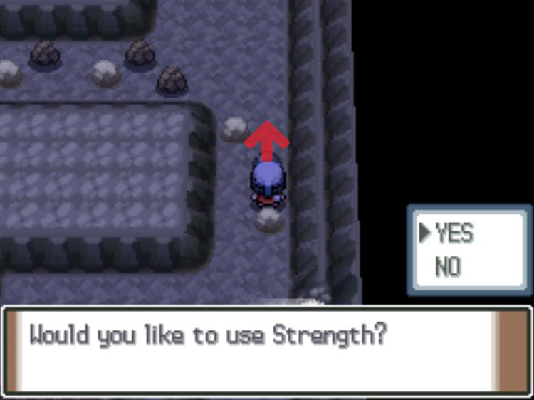 Using Strength to push the boulder up the hallway. / Pokémon Platinum