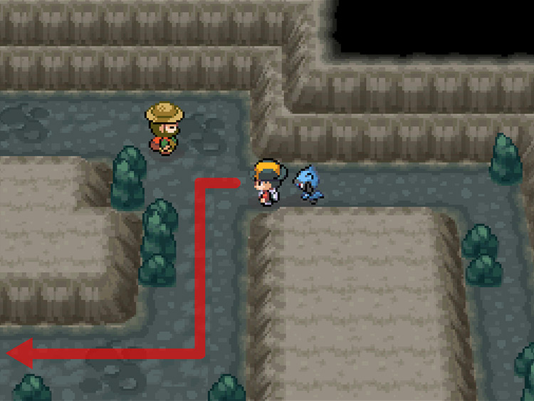The fork at B1 of Union Cave, with directional arrows leading to the lower path / Pokémon HGSS