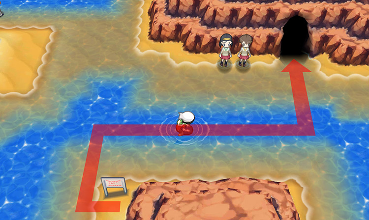 The entrance to the Shoal Cave from the Route 125 signboard. / Pokémon Omega Ruby and Alpha Sapphire
