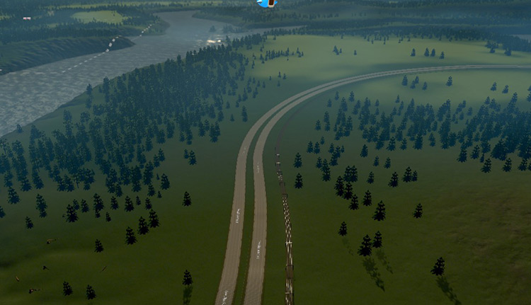 The external railway runs alongside the highway in the south / Cities: Skylines