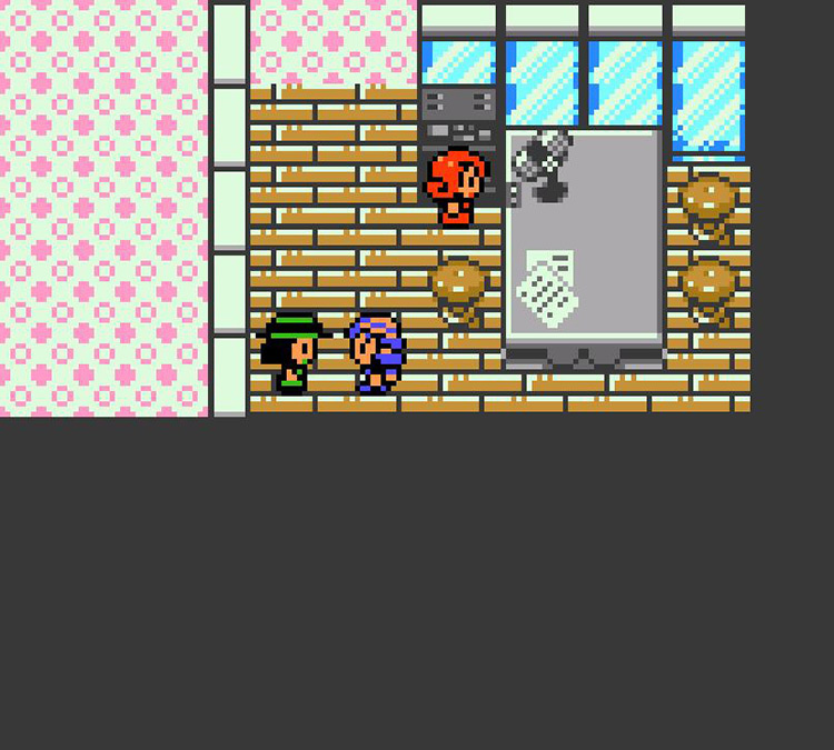 Facing the NPC in charge of Buena’s Password prizes. / Pokémon Crystal