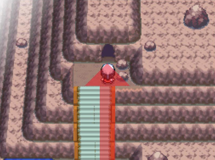 Climbing the stairs to enter Iron Island’s cave. / Pokémon Platinum