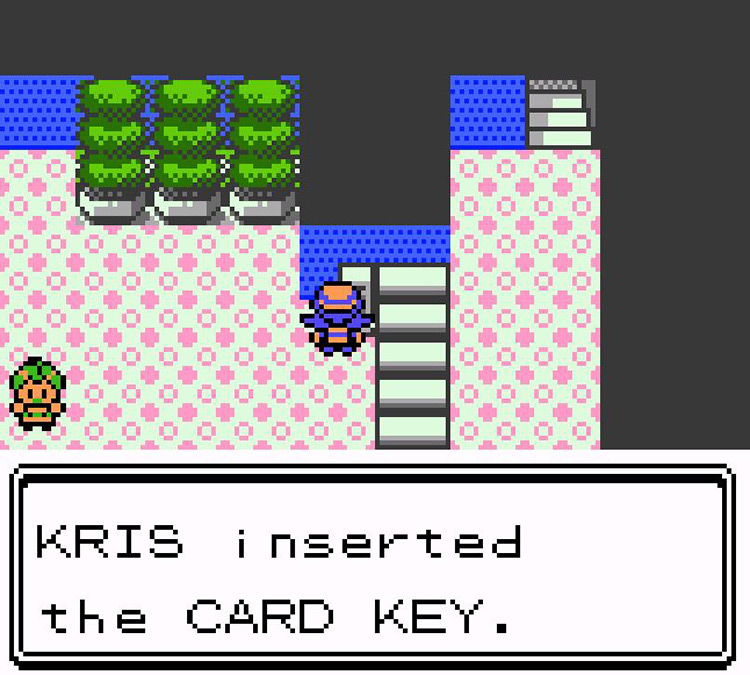 Using the Card Key to open the eastern gate in the Goldenrod Radio Tower, 3F. / Pokémon Crystal