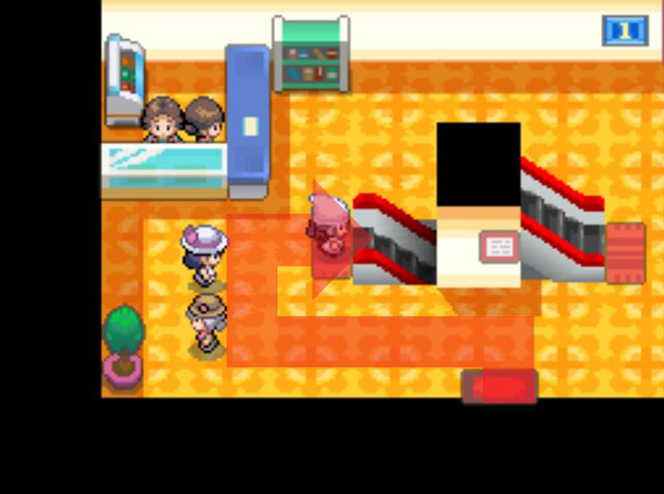 Heading down the escalator to the basement floor. / Pokémon Platinum