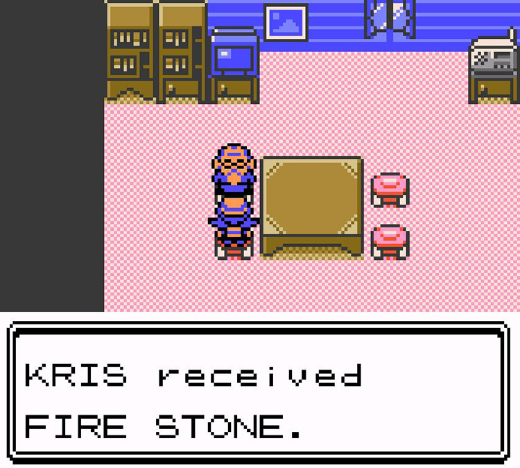 Receiving a Fire Stone from Bill’s Grandfather after showing him Growlithe. / Pokémon Crystal
