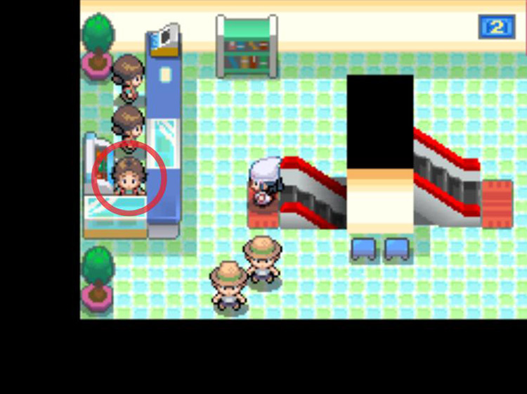 Approaching the clerk to the south of the western counter / Pokémon Platinum