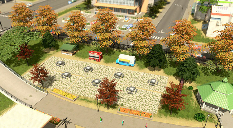 Details such as concession stands, benches, and trees add to your entertainment value. / Cities: Skylines