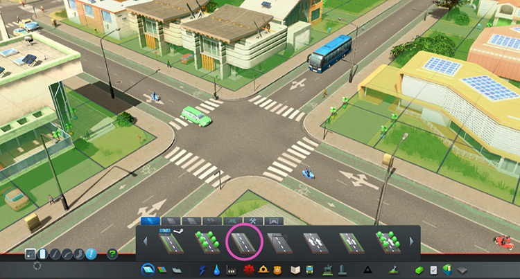 An intersection of streets that have bicycle lanes. / Cities: Skylines