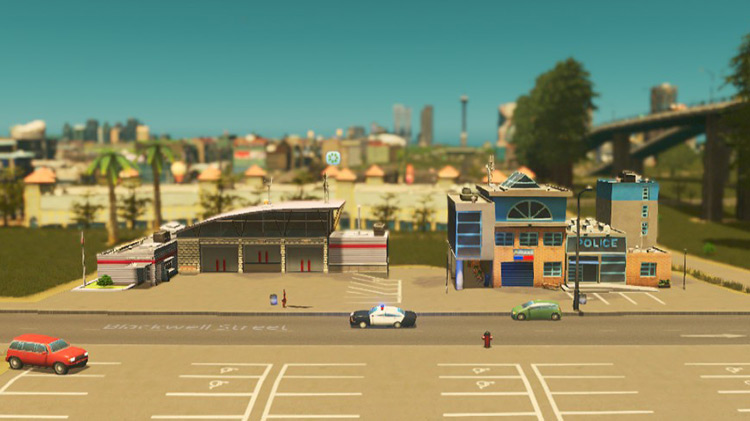 Vanilla fire house (left) and police station (right). / Cities: Skylines