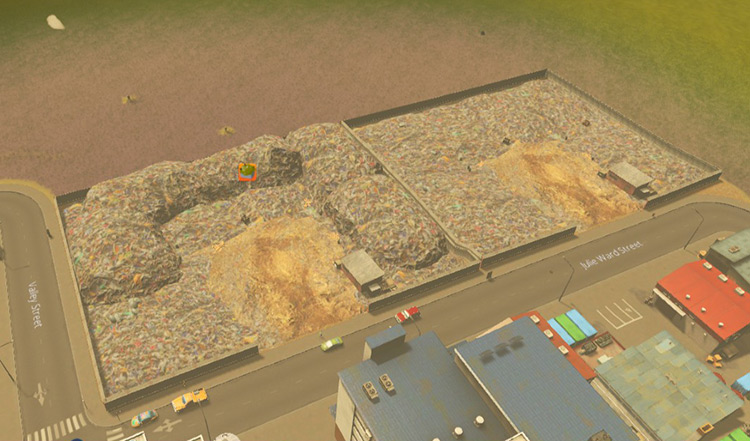 The full landfill on the left will be transferring garbage to the new one on the right / Cities: Skylines