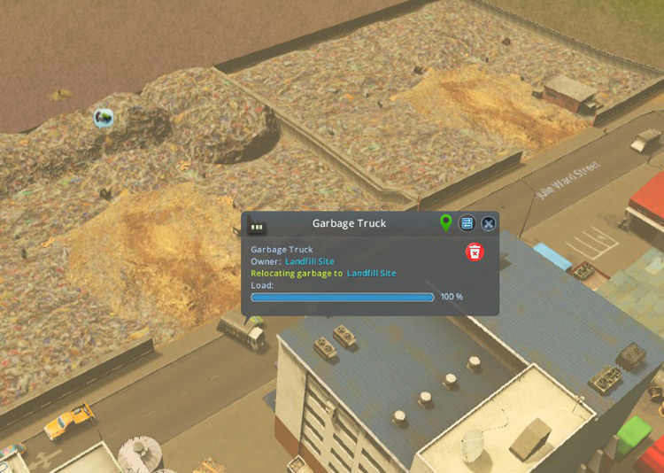One of the landfill’s trucks transferring garbage to the site right next to it / Cities: Skylines