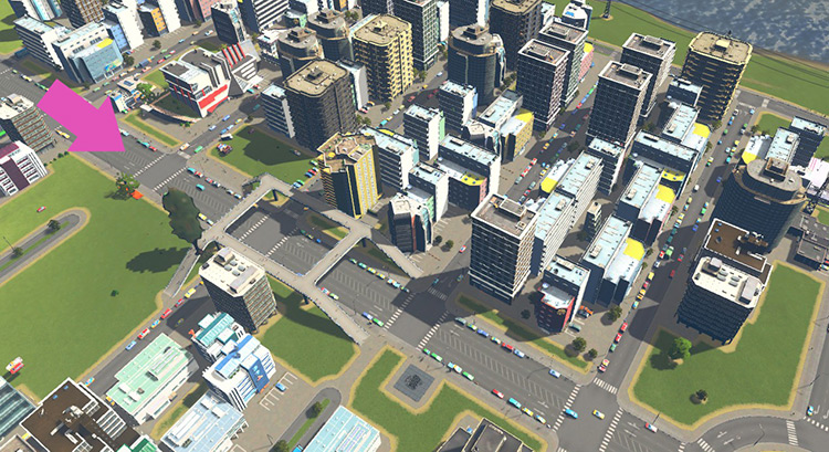 This four-lane road serves as a collector for the smaller streets connected to it / Cities: Skylines
