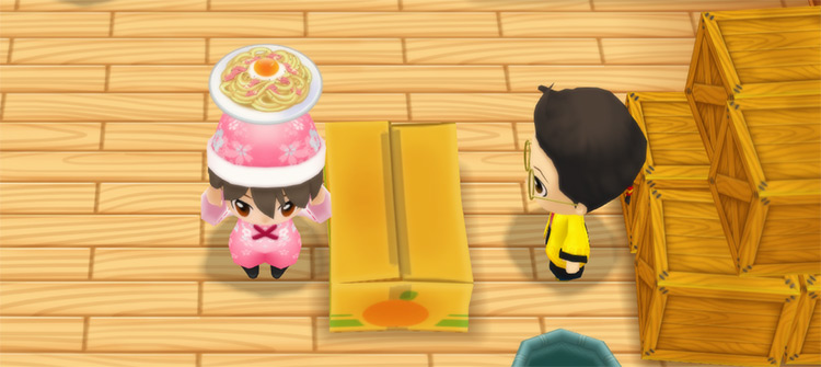 The farmer stands in front of Huang’s counter while holding a plate of Carbonara. / Story of Seasons: Friends of Mineral Town