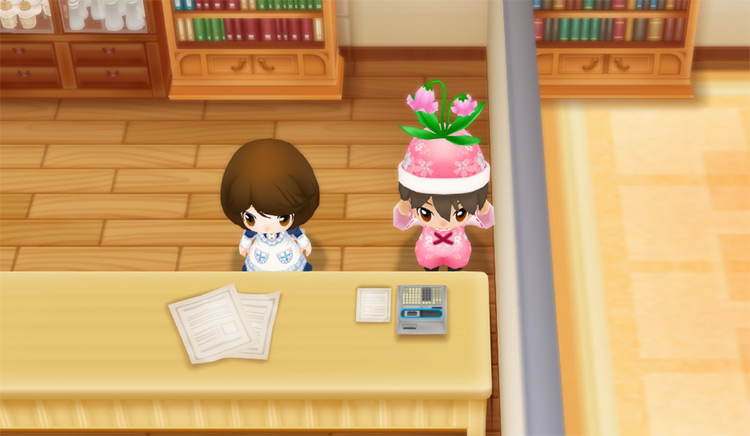 The farmer stands next to Elly while holding a Pink Cat Flower. / Story of Seasons: Friends of Mineral Town