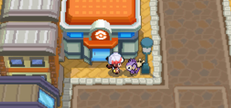 Standing in Goldenrod City in Pokémon HeartGold