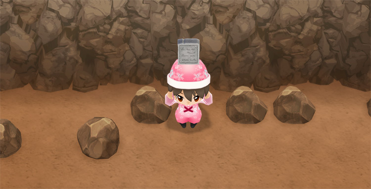 The farmer digs up the Tomatosetta Stone in the Spring Mine. / Story of Seasons: Friends of Mineral Town