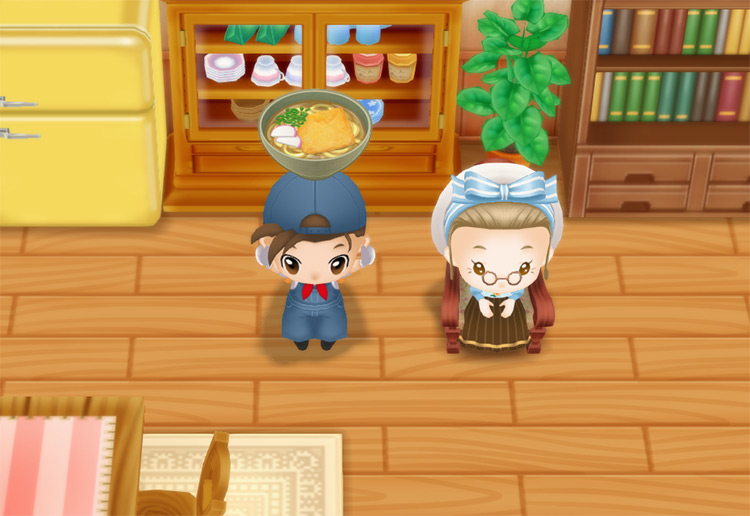 The farmer stands next to Ellen while holding a bowl of Udon. / Story of Seasons: Friends of Mineral Town