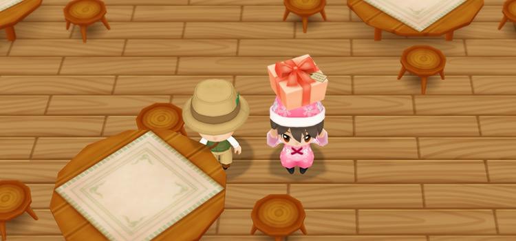 Standing next to Basil with a gift in SoS:FoMT