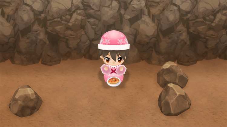The farmer eats Raisin Bread to restore stamina while mining. / Story of Seasons: Friends of Mineral Town