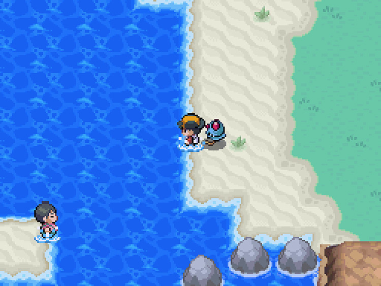 The player standing by the shore at the West of Cherrygrove City / Pokémon HGSS