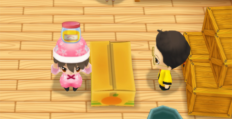 The farmer stands in front of Huang’s counter while holding a bottle of Stamina Booster XL. / Story of Seasons: Friends of Mineral Town